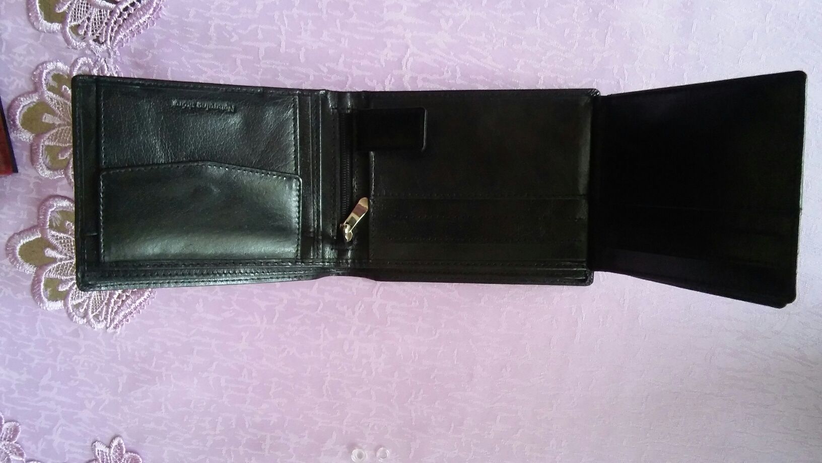 Skórzany portfel męski MELTONI. Oryginalny, nowy