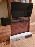 TV ramię Suboofer Boston AWS250 i Arcam Solo Bar Plus