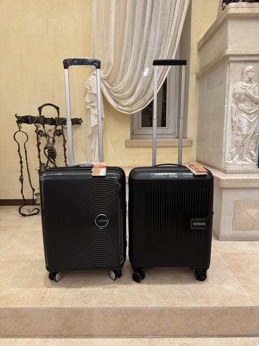 American tourister мала та снредня нові валізи