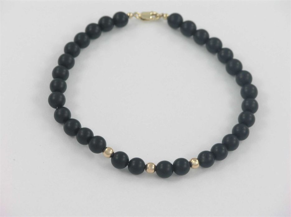 Męska bransoletka z onyksami i złotymi kulkami próby 585 matowa