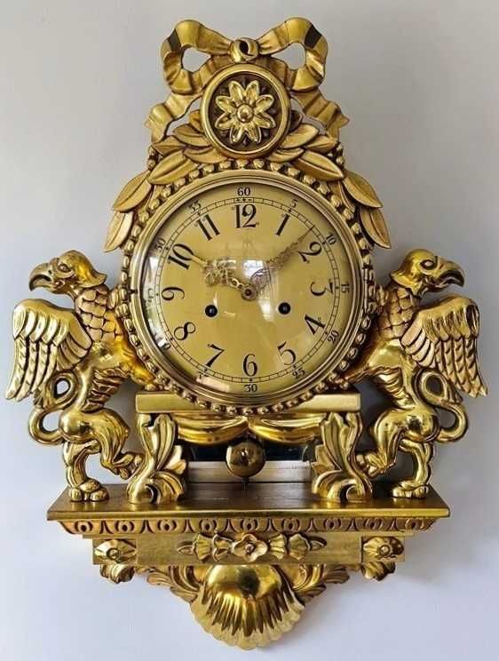 Zegar kartelowy - Svenskt Runa - zdobiony gryfami - złocony .