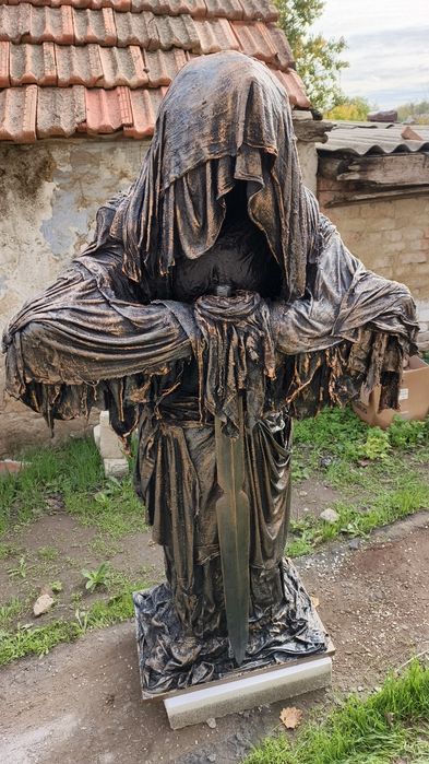 Декоративна садова статуя
