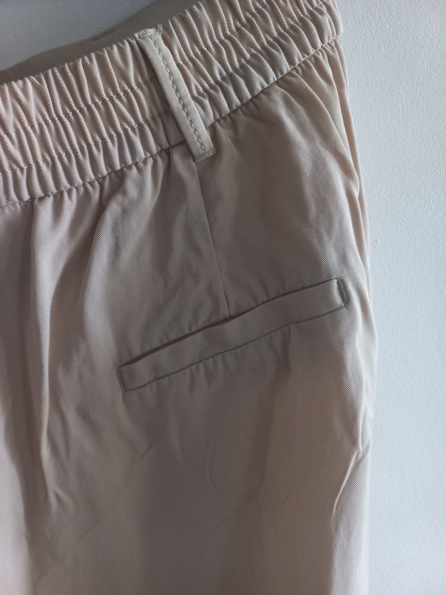 Beżowe eleganckie spodnie Zara rozmiar L