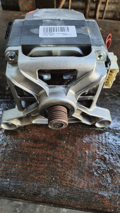 Двигун до пральної машини