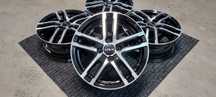 KIA 15" Nowe felgi aluminiowe 4x100 Picanto Rio Stonic czarno srebrne