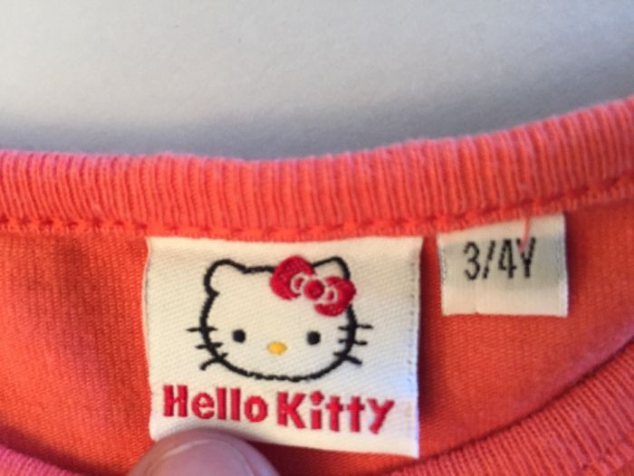 T shirt Hello Kitty tamanho 3-4 laranja menina