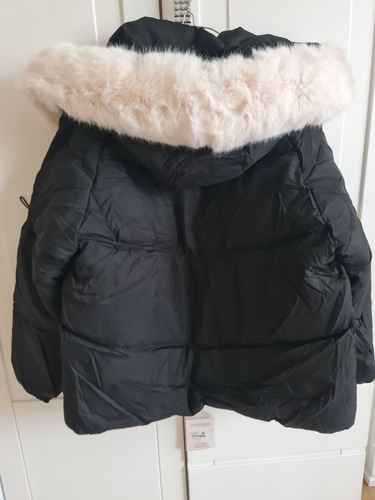 Продам новую куртку- пуховик  зима