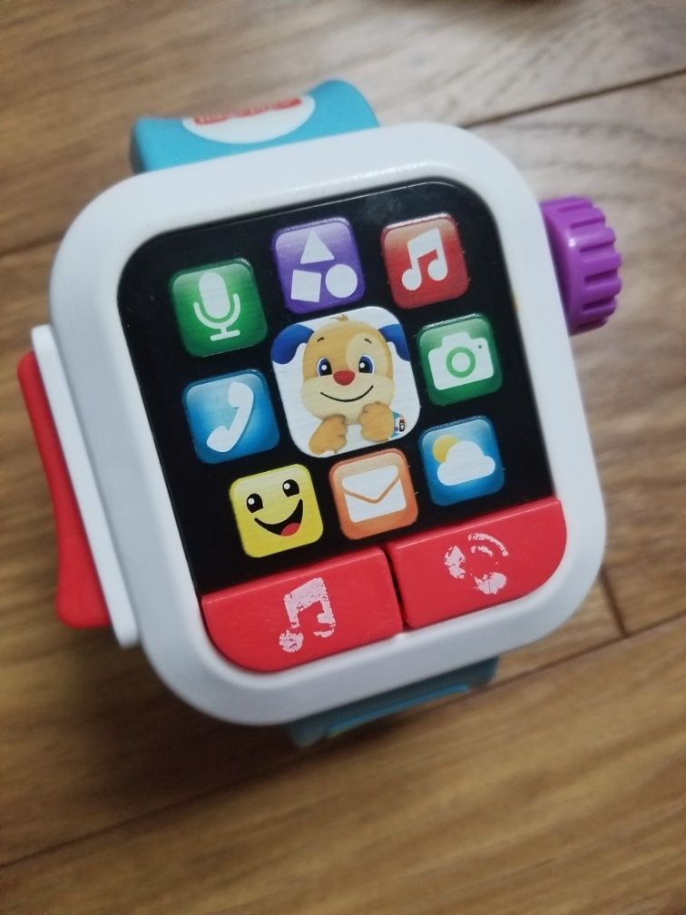 Zabawki interaktywne fisher price konsola zegarek clementoni bajka 6m+