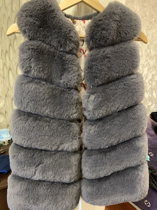 Продам мехову жилетку