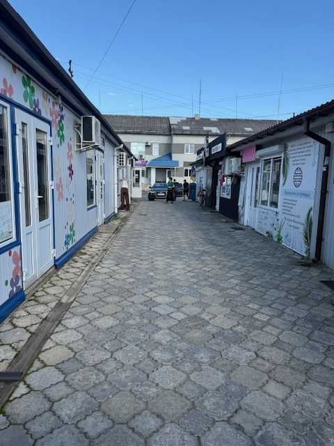 Продам ринок та магазини з орендарями