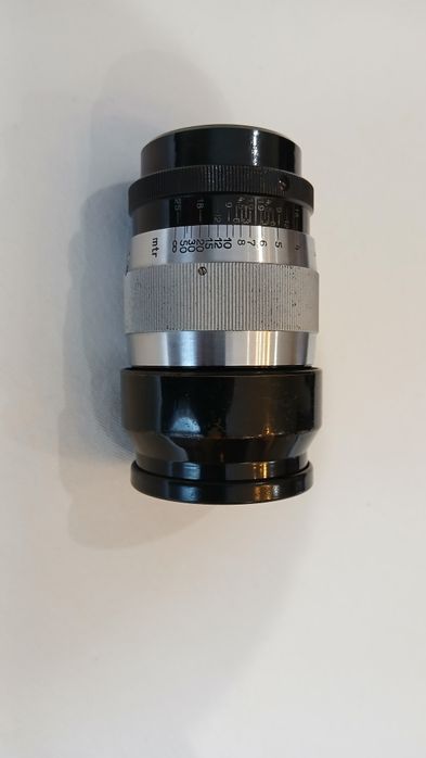 Objetiva LEICA Hektor 7,3 cm. c/ tampa e parasol