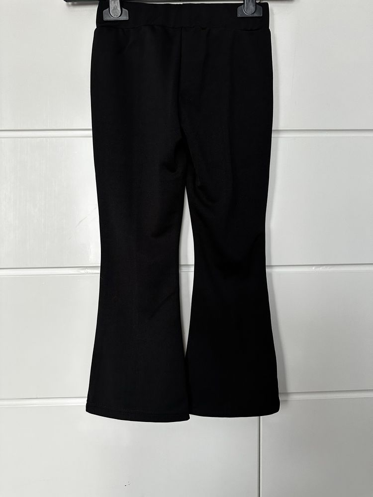 Nowe spodnie eleganckie czarne spodnie rozmiar 110-114