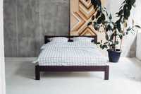 Стильне дерев'яне ліжко з масиву односпальне двоспальне на брусі