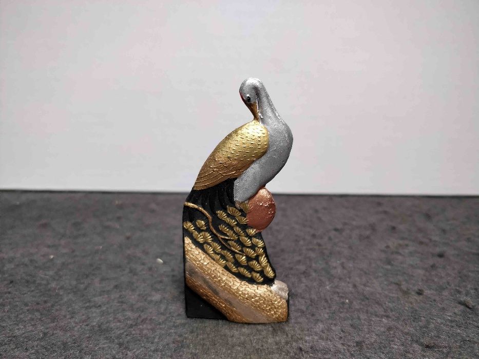Stick de Tinta da China em Pedra . Forma de Pavão