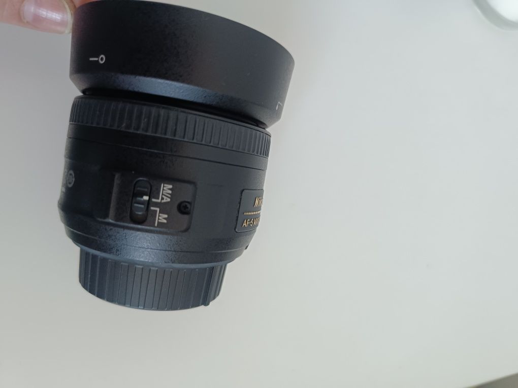Nikon D3500 + Lente 18-55mm + Lente 35mm foco M/A + Filtro polarizado
