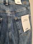 Джинси Skinny з невеличкими модними потертостямм