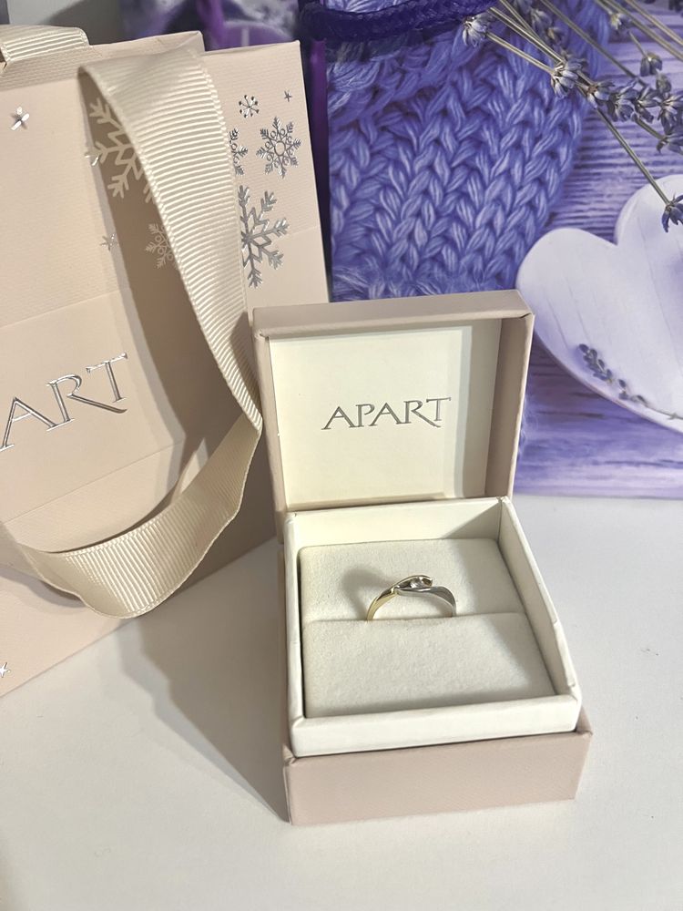 Pierścionek Apart diament 0,07 ct. białe i żółte złoto 585 rozm. 11.