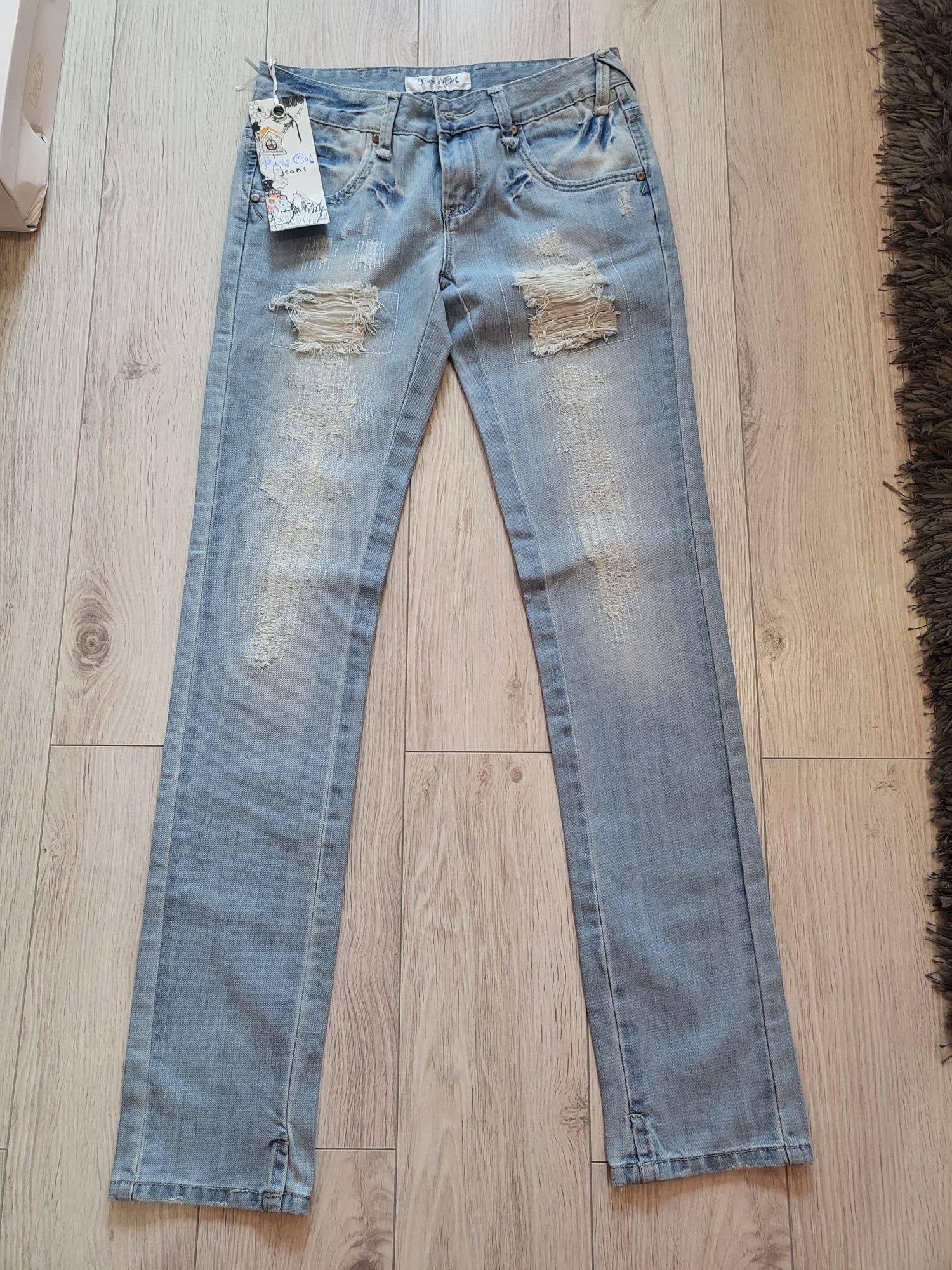 Nowe spodnie jeans rurki przetarcia