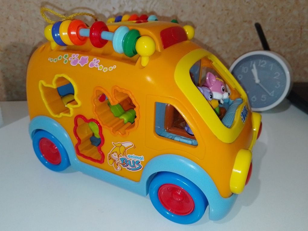Музыкальная машинка сортер Веселий автобус Hola toys