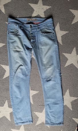 Spodnie męskie jasnoniebieskie  jeansy Reserved rozmiar W 33,  L 34