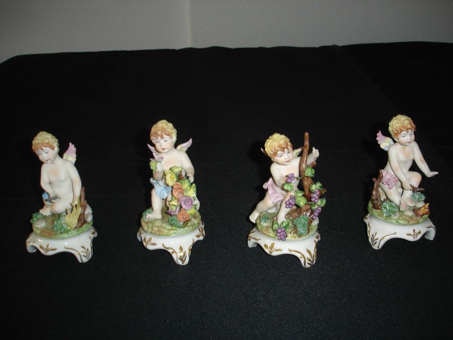 Conjunto de estatuetas em porcelana "As quatro estações do ano".