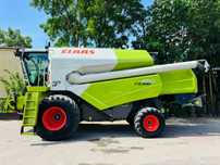 Claas Tucano 450 APS  CLAAS TUCANO 450 APS, silnik MERCEDES, heder V660 ze stołem do rzepaku