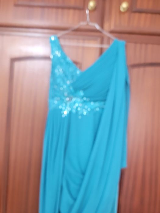 Vestido veste desde S ao M atras é elástico
