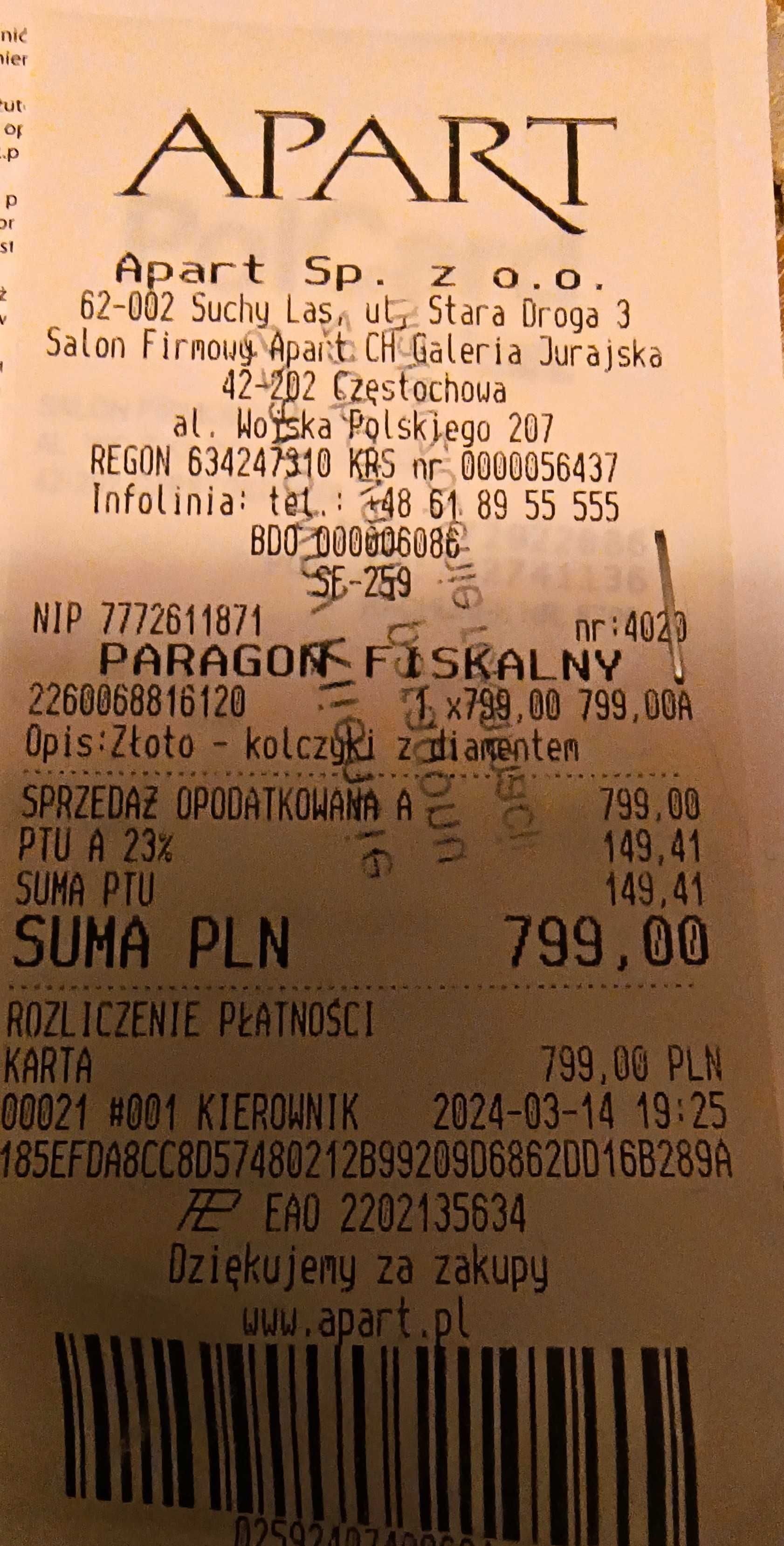 Złote kolczyki z perłą i diamentem.
