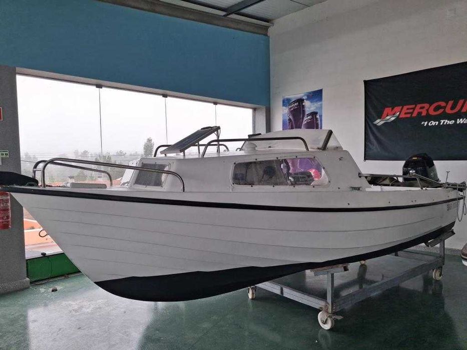 Barco OBE 4.70 com o motor TOHATSU 25HP  com trime 4T.
