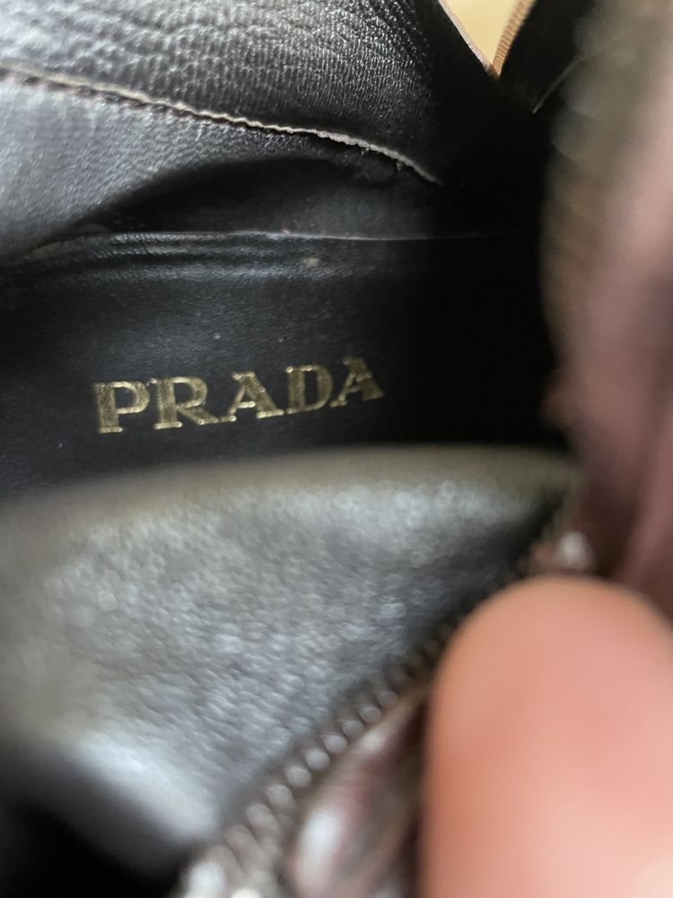 Кожаные сапоги Prada