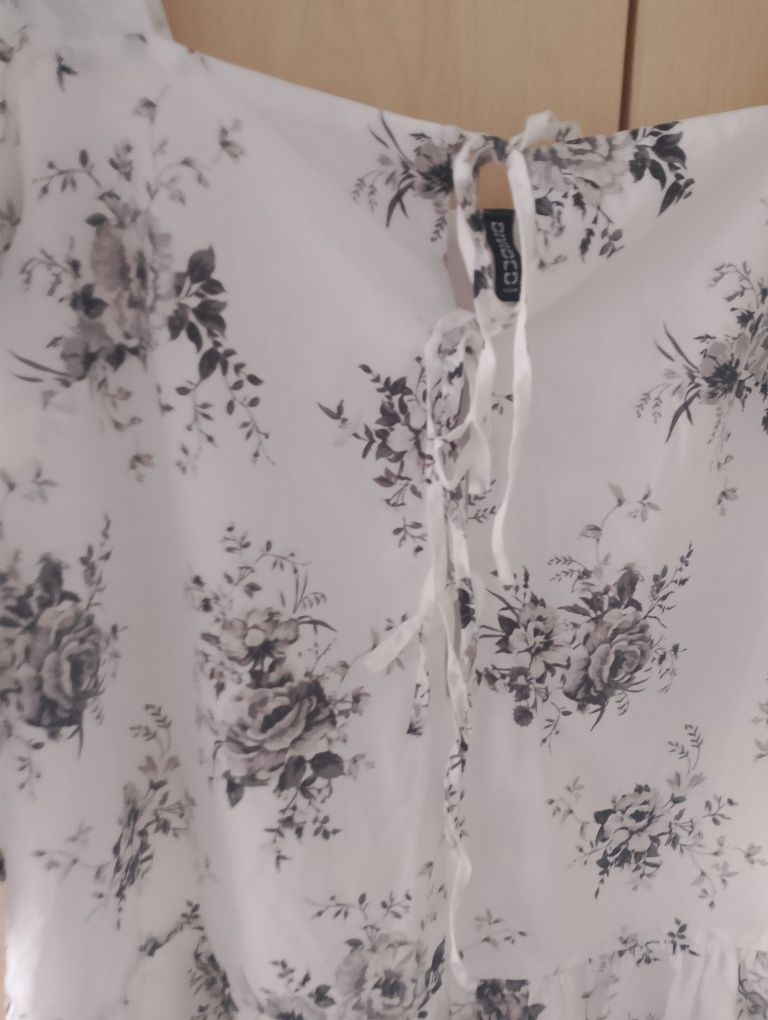 Bardzo ładna damską bluzka,z baskinką nowa H&M