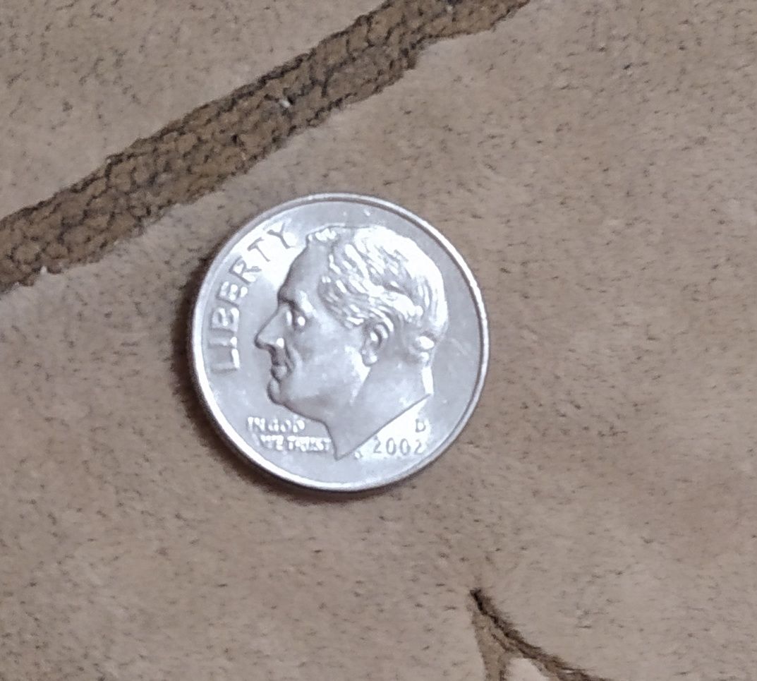 Монета one dime liberty 2002 года