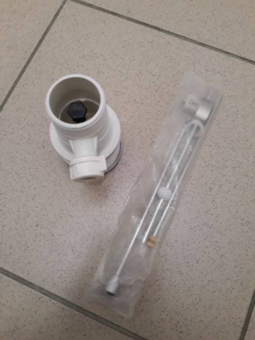 Korek do umywalki z przelewem