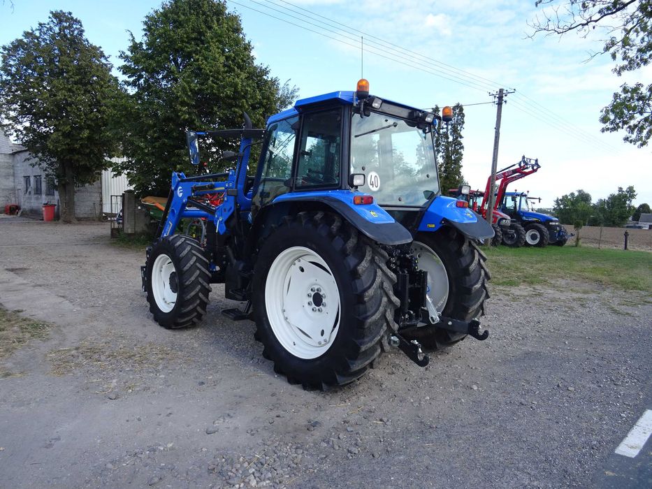 New Holland TS 115 z turem