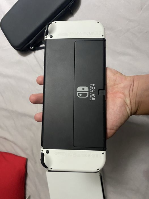 Nintendo switch Oled nova com 3 jogos fisicos