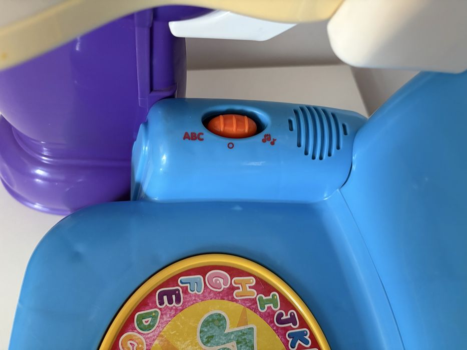 Krzesełko grające Fisher Price