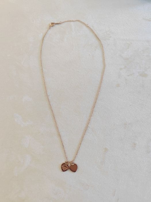 Naszyjnik z serduszkami różowe złoto T&Co