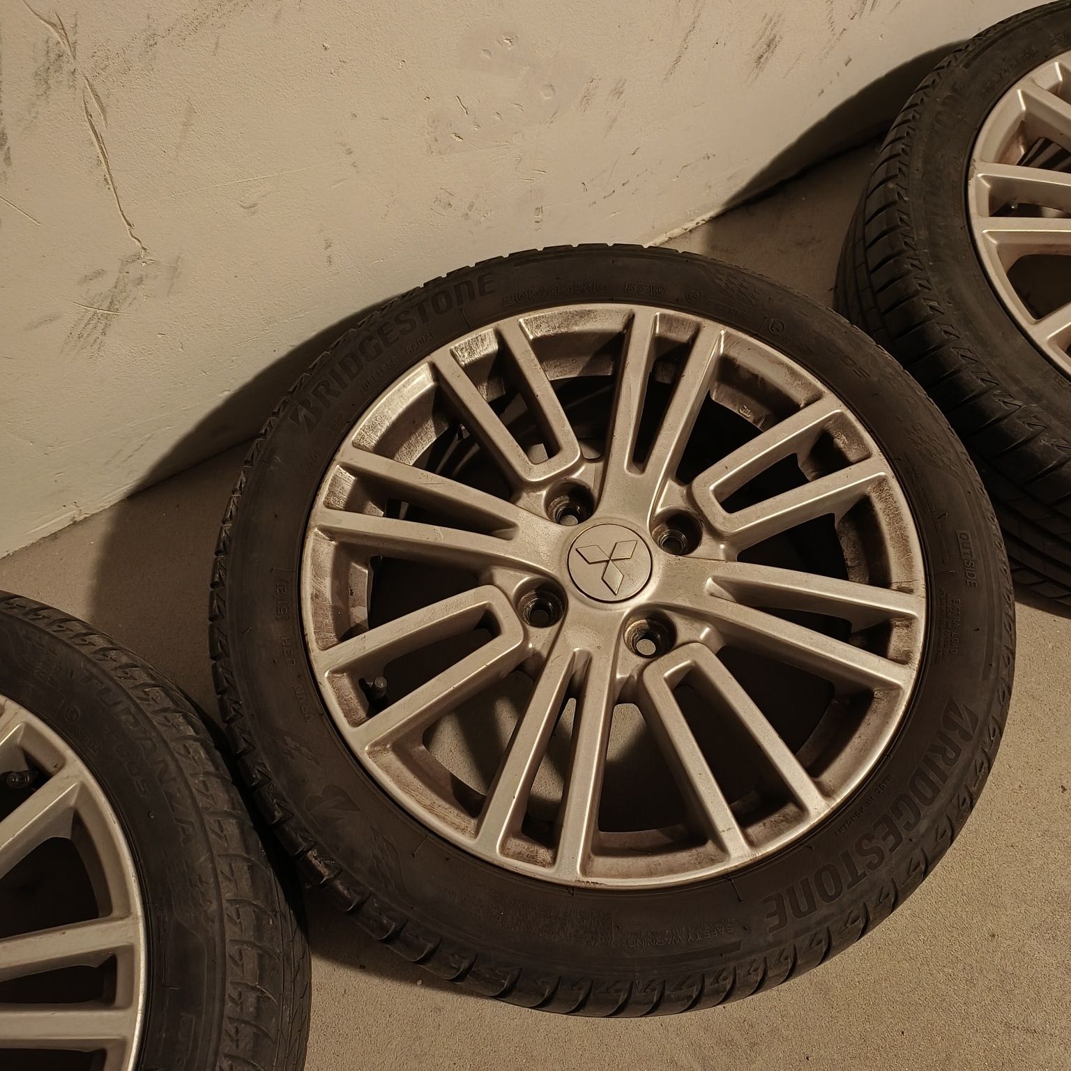 Felgi do Mitsubishi Colt VI z oponami Bridgestone Turanza 005