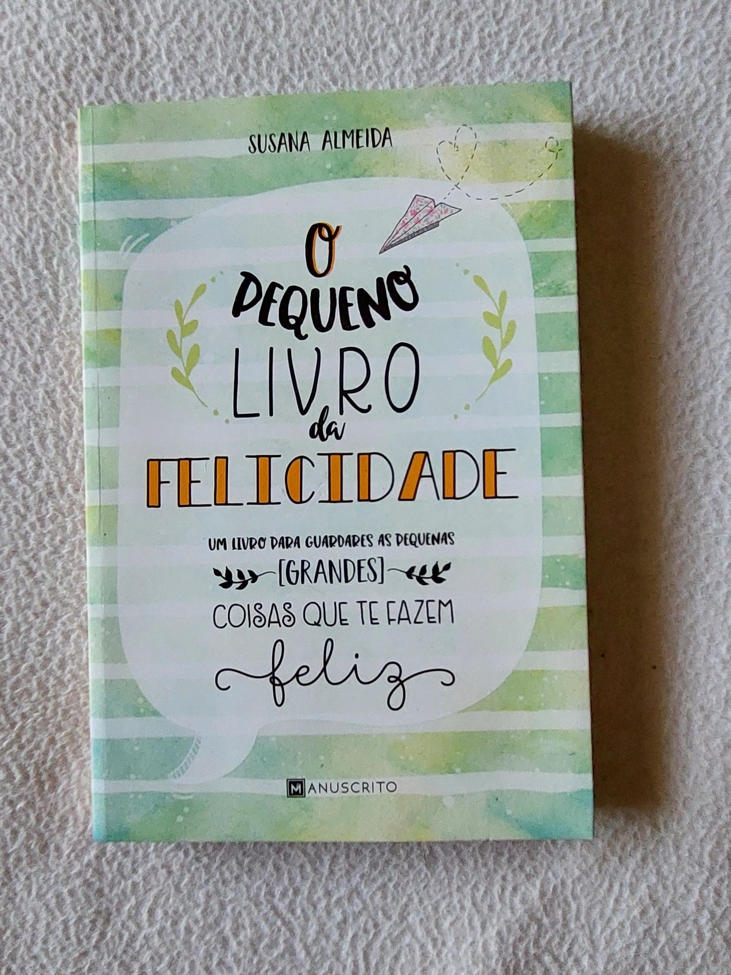 Livro "O pequeno livro da felicidade"