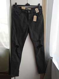 Levi's 710 super skinny nowe spodnie z dziurami jeansowe jeansy 31/30,