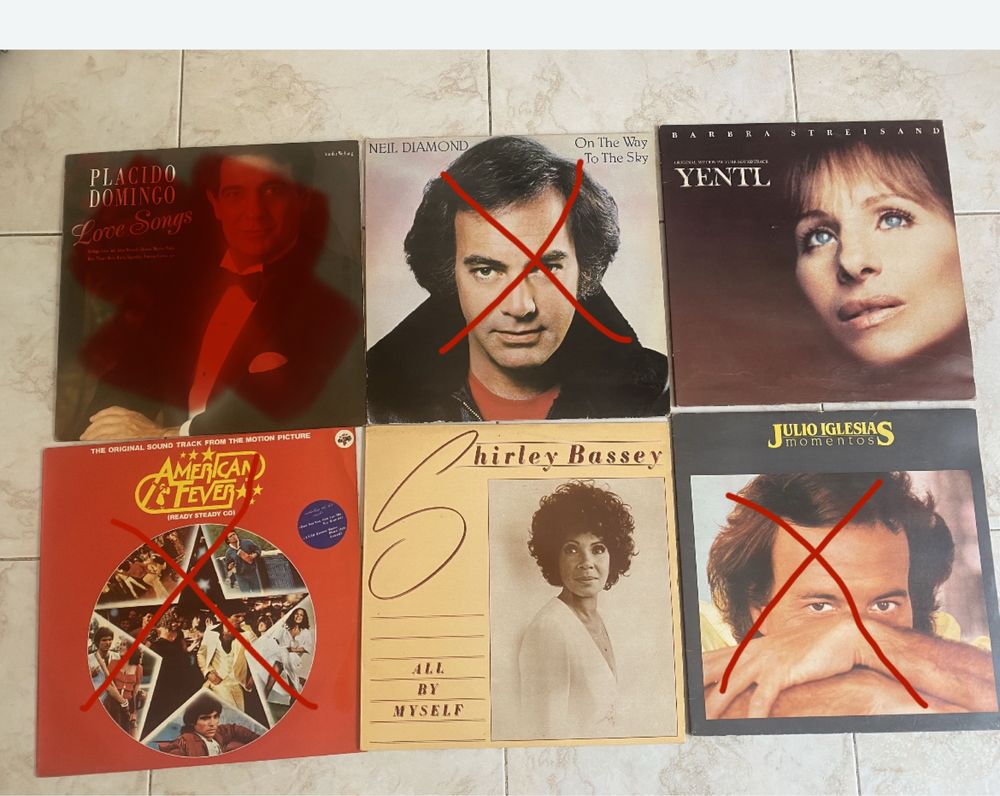Discos de vinil grandes e pequenos