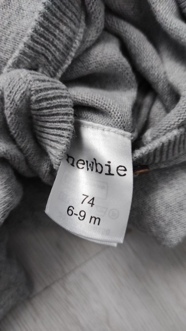 Rampers/ pajacyk firmy Newbie rozmiar 6-9 miesięcy