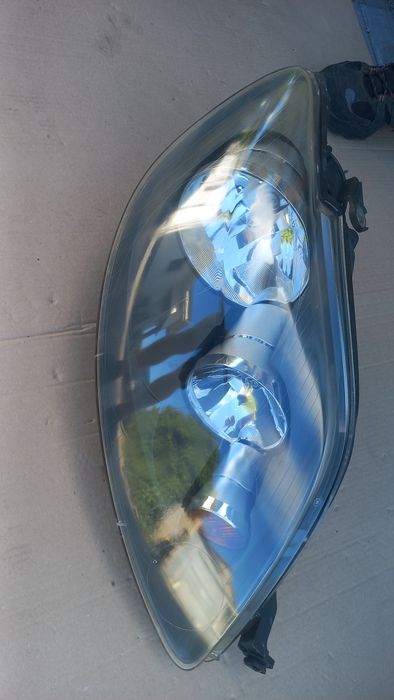 Vw golf 5 plus +reflektor lampa prawa prawy eu h7+h7