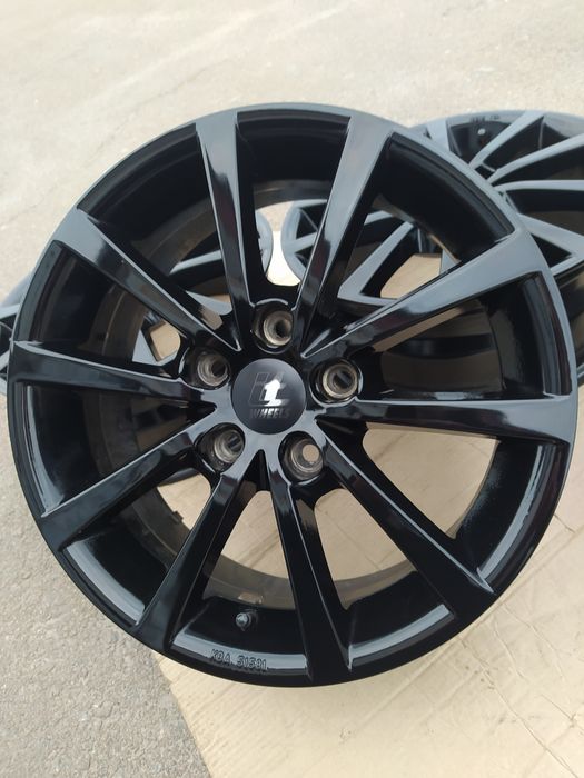 Диски Volkswagen Touran Golf Jetta Caddy Skoda Octavia Seat R16(5*112)