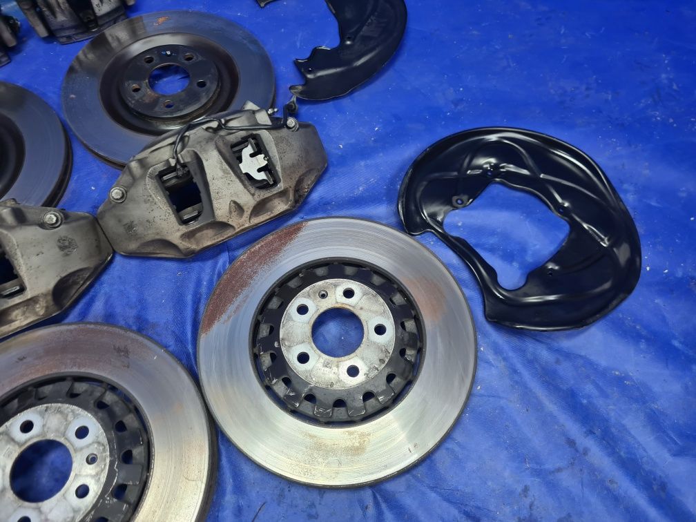 KOMPLET tarcz 375mm 340mm zaciski 6-tłoczkowe AUDI Q7 4M A6 C7 C8 OEM