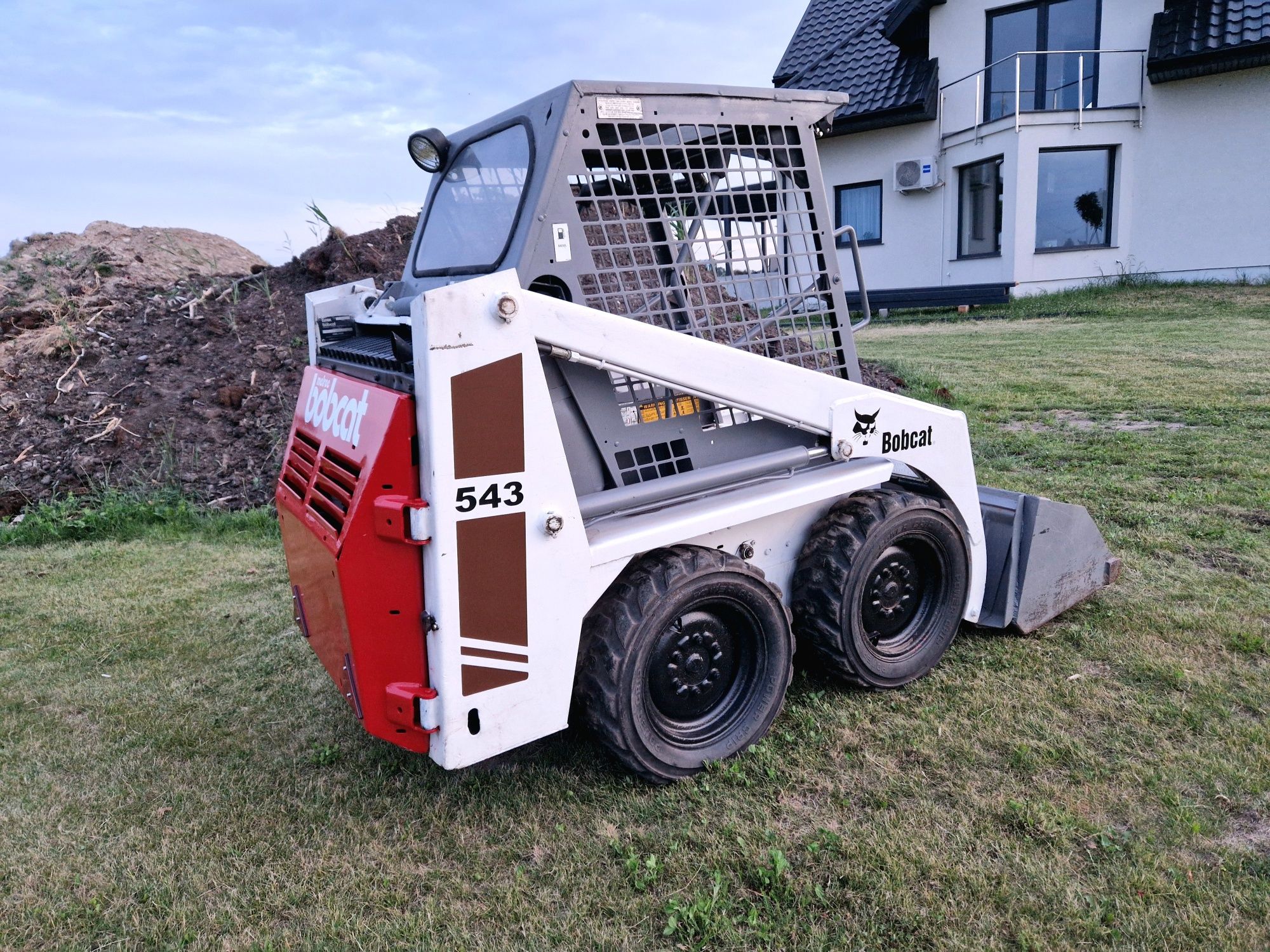Miniładowarka Bobcat 543 Łyżka paleciak nowe opony