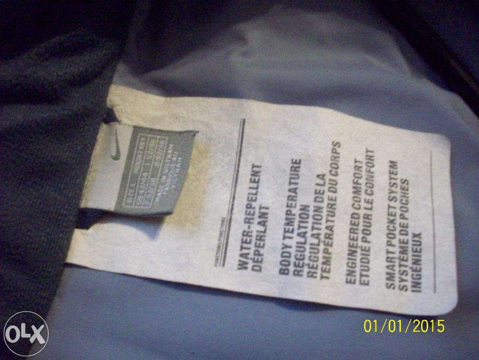 NIKE fajna kurtka na zimę stan bdb rozm. L (XL) z dopinanym kapturem
