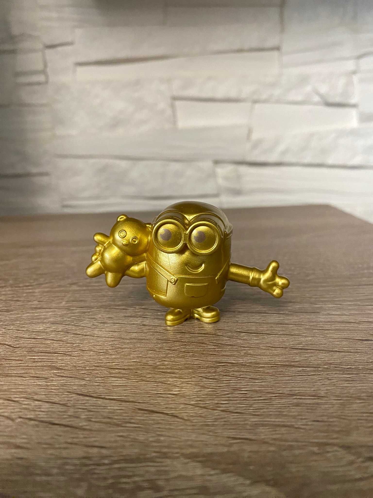 Złoty minionek mały dziecko zabawka figurka minionki