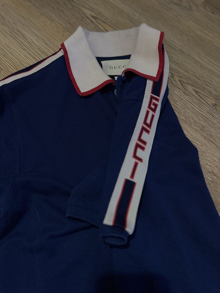 Поло від бренду Gucci