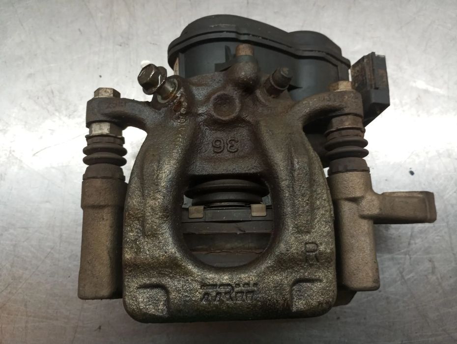 Pinça travão / maxila de travão trás esquerda NISSAN Qashqai II (J11)